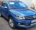 Синий Фольксваген Тигуан, объемом двигателя 1.97 л и пробегом 307 тыс. км за 12000 $, фото 1 на Automoto.ua