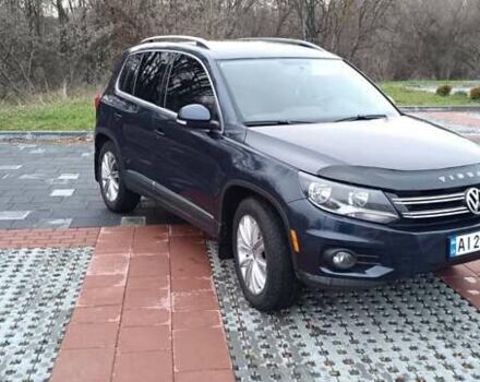 Синий Фольксваген Тигуан, объемом двигателя 2 л и пробегом 160 тыс. км за 10000 $, фото 1 на Automoto.ua