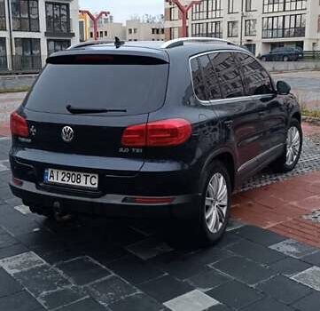 Синий Фольксваген Тигуан, объемом двигателя 2 л и пробегом 160 тыс. км за 10000 $, фото 7 на Automoto.ua