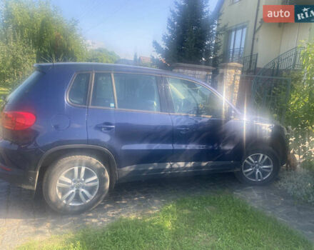 Синій Фольксваген Тігуан, об'ємом двигуна 1.4 л та пробігом 205 тис. км за 10990 $, фото 2 на Automoto.ua