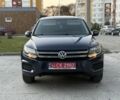 Синий Фольксваген Тигуан, объемом двигателя 2 л и пробегом 210 тыс. км за 9800 $, фото 1 на Automoto.ua