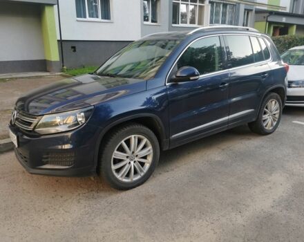 Синий Фольксваген Тигуан, объемом двигателя 2 л и пробегом 153 тыс. км за 9500 $, фото 1 на Automoto.ua