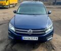 Синий Фольксваген Тигуан, объемом двигателя 2 л и пробегом 213 тыс. км за 11000 $, фото 1 на Automoto.ua