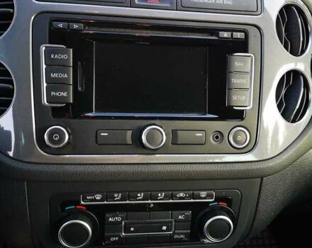 Синий Фольксваген Тигуан, объемом двигателя 1.39 л и пробегом 179 тыс. км за 11500 $, фото 7 на Automoto.ua