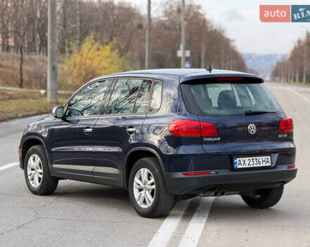 Синий Фольксваген Тигуан, объемом двигателя 2 л и пробегом 170 тыс. км за 10200 $, фото 2 на Automoto.ua