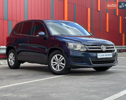 Синий Фольксваген Тигуан, объемом двигателя 2 л и пробегом 219 тыс. км за 12000 $, фото 1 на Automoto.ua