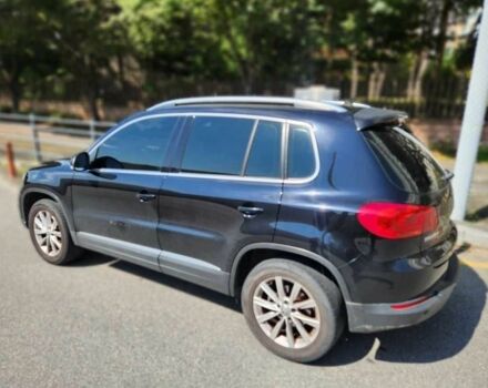 Синій Фольксваген Тігуан, об'ємом двигуна 2 л та пробігом 76 тис. км за 6955 $, фото 2 на Automoto.ua