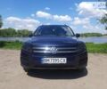 Синий Фольксваген Тигуан, объемом двигателя 2 л и пробегом 170 тыс. км за 13400 $, фото 1 на Automoto.ua