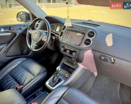 Синий Фольксваген Тигуан, объемом двигателя 2 л и пробегом 121 тыс. км за 16800 $, фото 59 на Automoto.ua