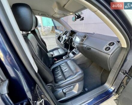 Синий Фольксваген Тигуан, объемом двигателя 2 л и пробегом 165 тыс. км за 16200 $, фото 51 на Automoto.ua