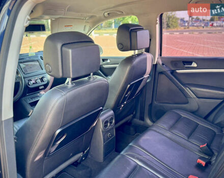 Синий Фольксваген Тигуан, объемом двигателя 2 л и пробегом 121 тыс. км за 16800 $, фото 48 на Automoto.ua