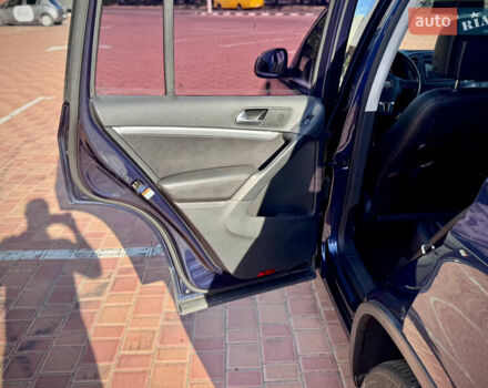 Синий Фольксваген Тигуан, объемом двигателя 2 л и пробегом 121 тыс. км за 16800 $, фото 72 на Automoto.ua