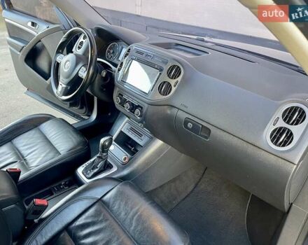 Синий Фольксваген Тигуан, объемом двигателя 2 л и пробегом 165 тыс. км за 16200 $, фото 54 на Automoto.ua