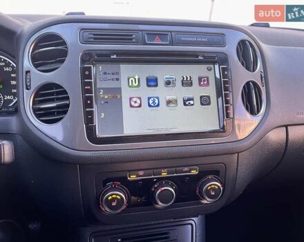 Синий Фольксваген Тигуан, объемом двигателя 2 л и пробегом 165 тыс. км за 16200 $, фото 59 на Automoto.ua