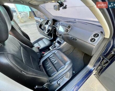 Синий Фольксваген Тигуан, объемом двигателя 2 л и пробегом 165 тыс. км за 16200 $, фото 53 на Automoto.ua