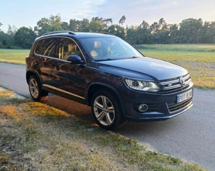 Синий Фольксваген Тигуан, объемом двигателя 2 л и пробегом 174 тыс. км за 8500 $, фото 1 на Automoto.ua