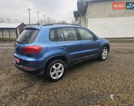 Синий Фольксваген Тигуан, объемом двигателя 2 л и пробегом 152 тыс. км за 10700 $, фото 1 на Automoto.ua