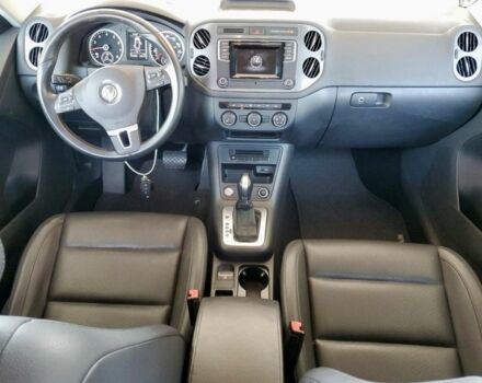 Синий Фольксваген Тигуан, объемом двигателя 2 л и пробегом 130 тыс. км за 9600 $, фото 4 на Automoto.ua