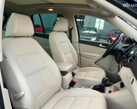 Синий Фольксваген Тигуан, объемом двигателя 2 л и пробегом 191 тыс. км за 14490 $, фото 39 на Automoto.ua