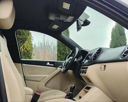 Синий Фольксваген Тигуан, объемом двигателя 2 л и пробегом 129 тыс. км за 12700 $, фото 51 на Automoto.ua