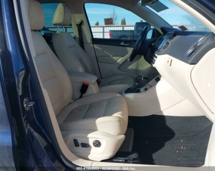 Синий Фольксваген Тигуан, объемом двигателя 2 л и пробегом 140 тыс. км за 9350 $, фото 6 на Automoto.ua