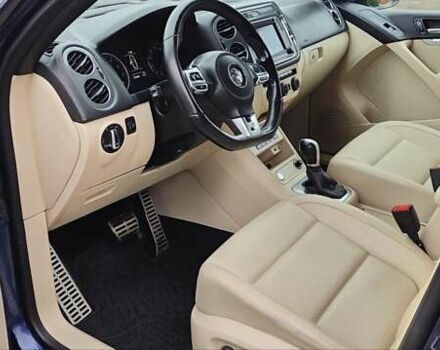 Синий Фольксваген Тигуан, объемом двигателя 2 л и пробегом 129 тыс. км за 12700 $, фото 39 на Automoto.ua