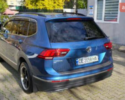 Синій Фольксваген Тігуан, об'ємом двигуна 1.98 л та пробігом 124 тис. км за 16000 $, фото 3 на Automoto.ua