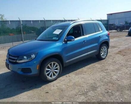 Синий Фольксваген Тигуан, объемом двигателя 2 л и пробегом 63 тыс. км за 1800 $, фото 1 на Automoto.ua