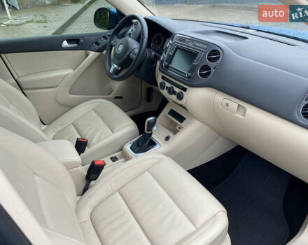 Синій Фольксваген Тігуан, об'ємом двигуна 2 л та пробігом 149 тис. км за 16950 $, фото 57 на Automoto.ua