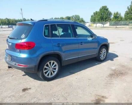 Синий Фольксваген Тигуан, объемом двигателя 2 л и пробегом 63 тыс. км за 1800 $, фото 3 на Automoto.ua