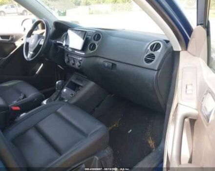 Синий Фольксваген Тигуан, объемом двигателя 2 л и пробегом 63 тыс. км за 1800 $, фото 4 на Automoto.ua