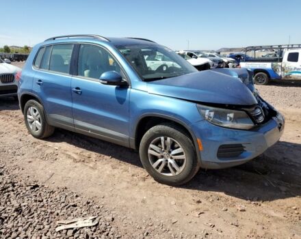 Синий Фольксваген Тигуан, объемом двигателя 2 л и пробегом 103 тыс. км за 9500 $, фото 2 на Automoto.ua