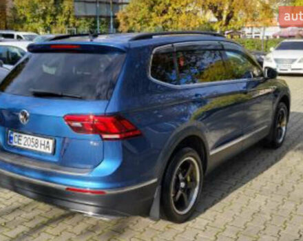 Синій Фольксваген Тігуан, об'ємом двигуна 1.98 л та пробігом 124 тис. км за 16000 $, фото 4 на Automoto.ua