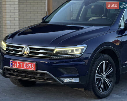 Синий Фольксваген Тигуан, объемом двигателя 2 л и пробегом 253 тыс. км за 22600 $, фото 1 на Automoto.ua