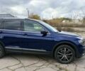 Синій Фольксваген Тігуан, об'ємом двигуна 2 л та пробігом 234 тис. км за 28400 $, фото 1 на Automoto.ua