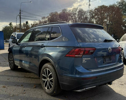 Синий Фольксваген Тигуан, объемом двигателя 2 л и пробегом 128 тыс. км за 18500 $, фото 1 на Automoto.ua