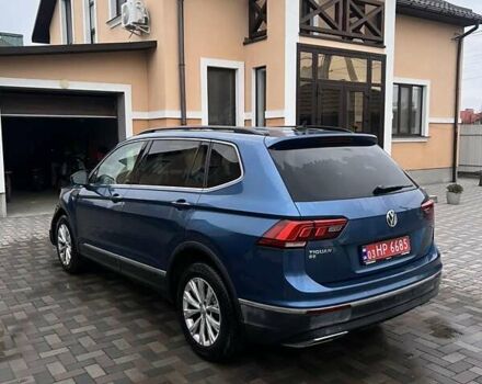 Синій Фольксваген Тігуан, об'ємом двигуна 2 л та пробігом 193 тис. км за 14700 $, фото 1 на Automoto.ua