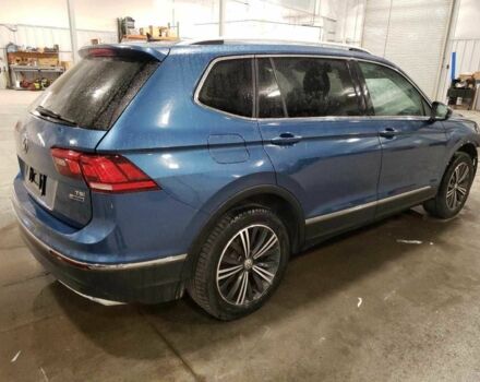 Синий Фольксваген Тигуан, объемом двигателя 2 л и пробегом 193 тыс. км за 13700 $, фото 3 на Automoto.ua