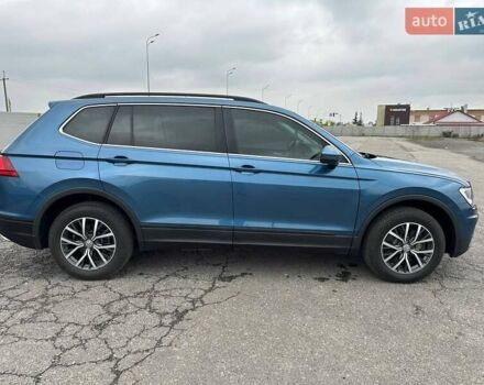 Синий Фольксваген Тигуан, объемом двигателя 2 л и пробегом 213 тыс. км за 17800 $, фото 4 на Automoto.ua