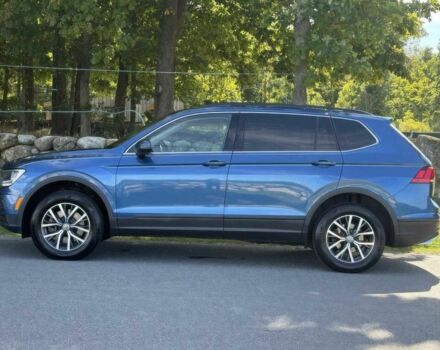 Синій Фольксваген Тігуан, об'ємом двигуна 2 л та пробігом 49 тис. км за 7800 $, фото 4 на Automoto.ua