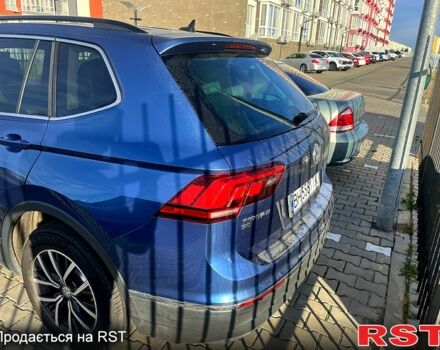 Синий Фольксваген Тигуан, объемом двигателя 2 л и пробегом 150 тыс. км за 25000 $, фото 2 на Automoto.ua