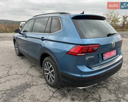 Синий Фольксваген Тигуан, объемом двигателя 2 л и пробегом 213 тыс. км за 17800 $, фото 7 на Automoto.ua