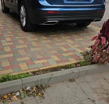 Синий Фольксваген Тигуан, объемом двигателя 2 л и пробегом 153 тыс. км за 19350 $, фото 2 на Automoto.ua