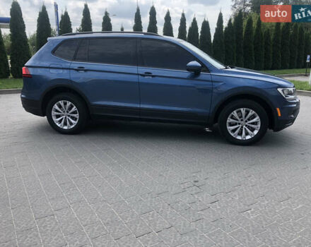 Синий Фольксваген Тигуан, объемом двигателя 2 л и пробегом 185 тыс. км за 16800 $, фото 6 на Automoto.ua
