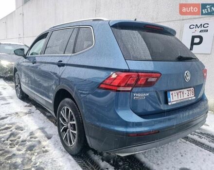 Синий Фольксваген Тигуан, объемом двигателя 2 л и пробегом 60 тыс. км за 14100 $, фото 2 на Automoto.ua