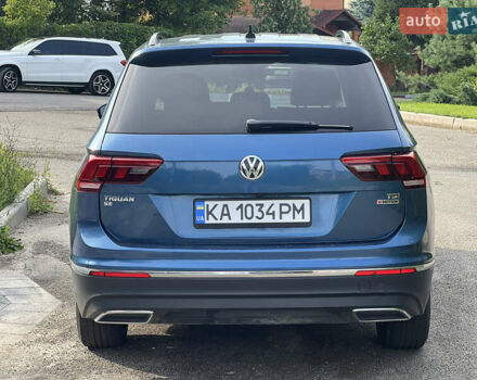 Синій Фольксваген Тігуан, об'ємом двигуна 1.98 л та пробігом 215 тис. км за 16000 $, фото 3 на Automoto.ua