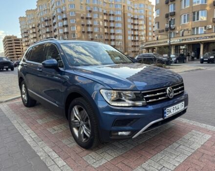 Синий Фольксваген Тигуан, объемом двигателя 2 л и пробегом 124 тыс. км за 23500 $, фото 2 на Automoto.ua