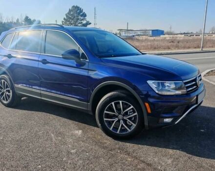 Синий Фольксваген Тигуан, объемом двигателя 2 л и пробегом 121 тыс. км за 12400 $, фото 1 на Automoto.ua