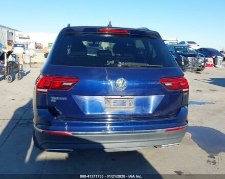 Синий Фольксваген Тигуан, объемом двигателя 2 л и пробегом 99 тыс. км за 13700 $, фото 4 на Automoto.ua