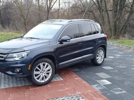 Синий Фольксваген Тигуан, объемом двигателя 2 л и пробегом 160 тыс. км за 10000 $, фото 1 на Automoto.ua
